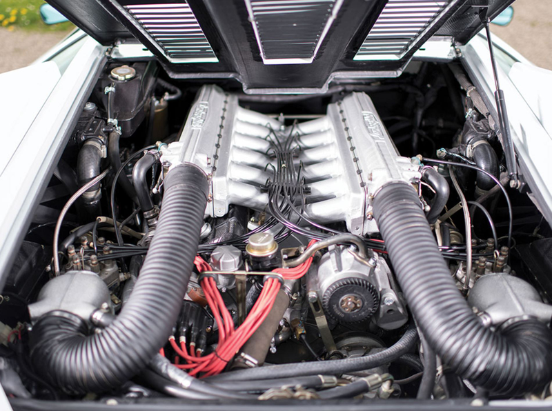 Illustration for article titled I Am Morally Offended By This Gold-Plated Lamborghini Countach Interior
